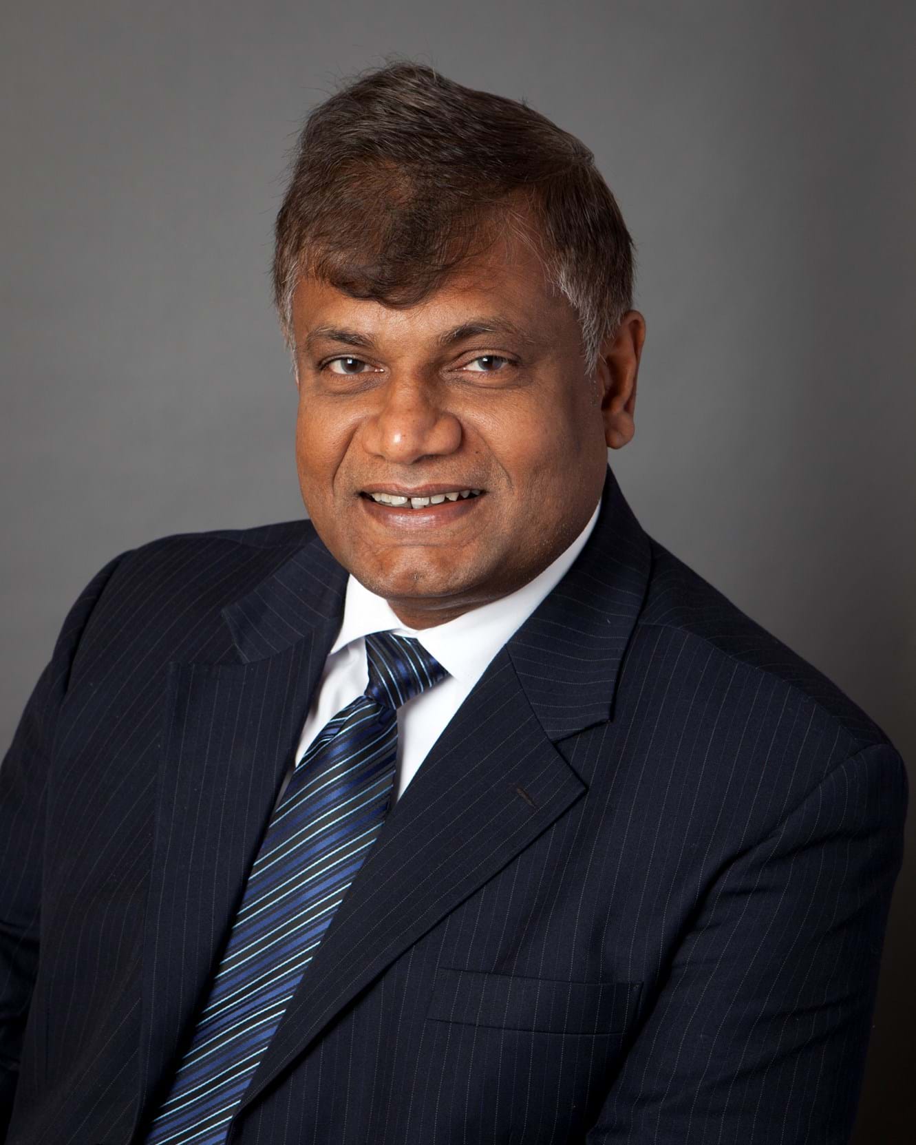 Corporate Portrait Photography | Melbourne Photography | Individual head and shoulder corporate photo of man on grey background