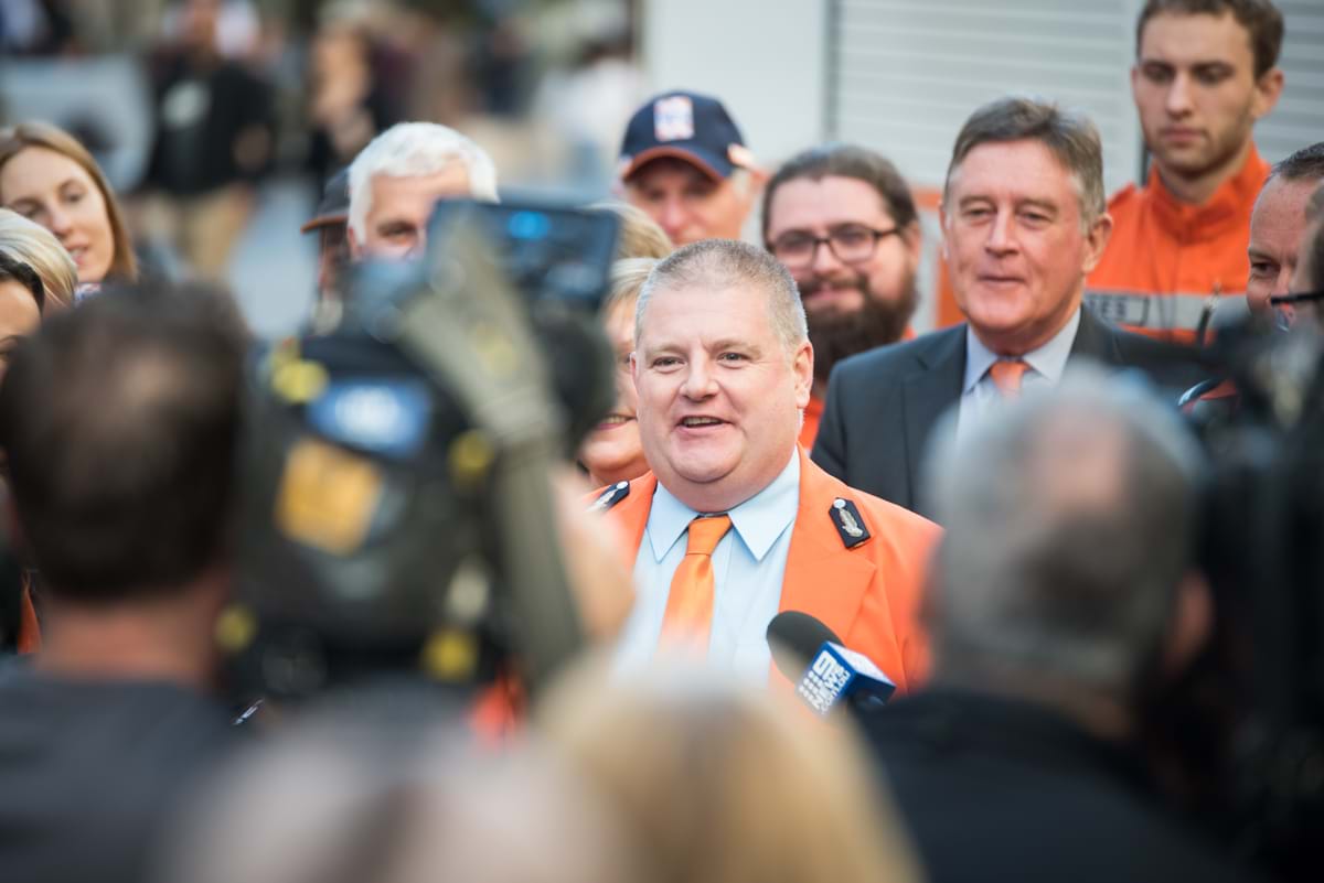 Corporate Event Photography | Melbourne Photography | Close up of  man in crowd of people