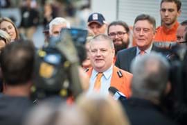 Corporate Event Photography | Melbourne Photography | Close up of man in crowd of people